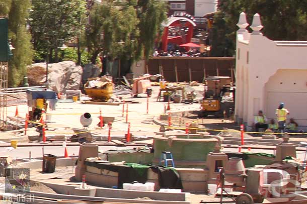 Here you can see the new fountain in the foreground, its pump house off to the right, and a look down the parade route that looks to have been re-poured already.