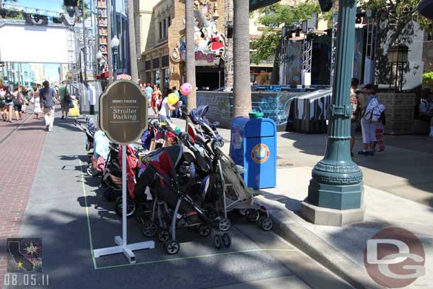 The stroller parking is out in the street now.