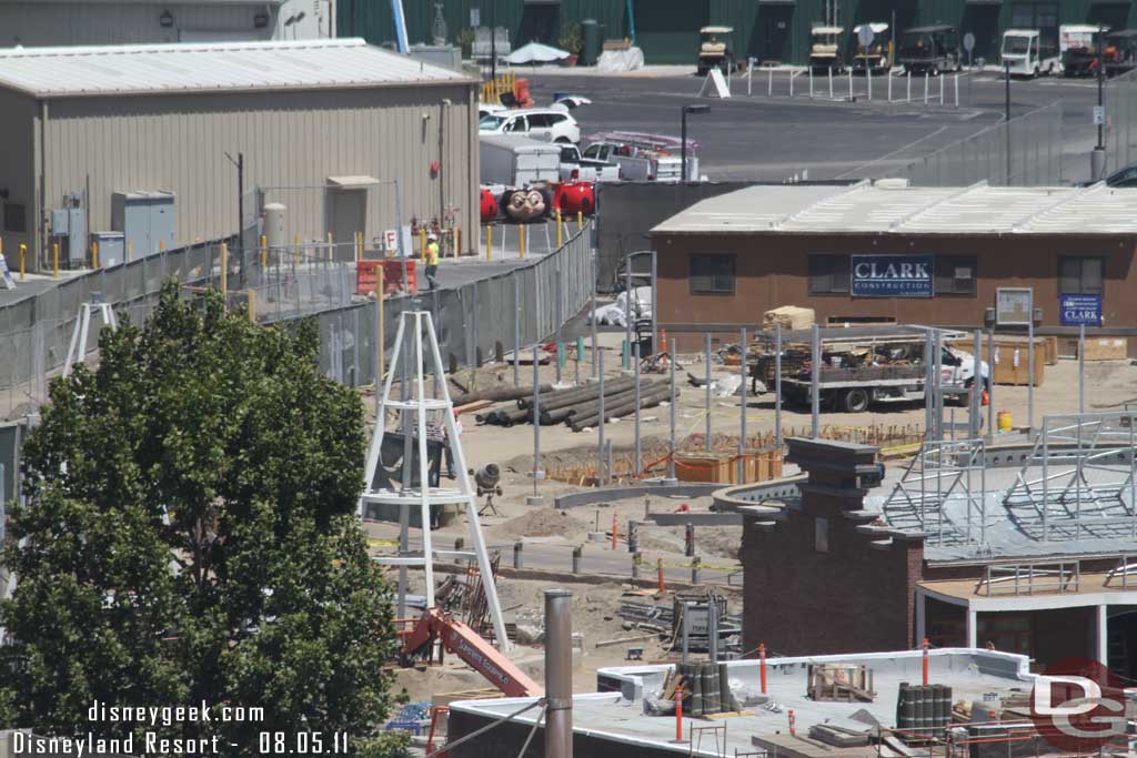 More curbs and foundations going in behind/next to the Flying Tires.  Also noticed all the poles in the back.  Guessing those are going to Maters since they have some in already.  Lastly the fence is not pushed out and along the new road/walkway that went in.