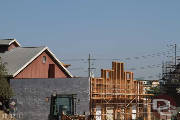 The facade on this building is going up.