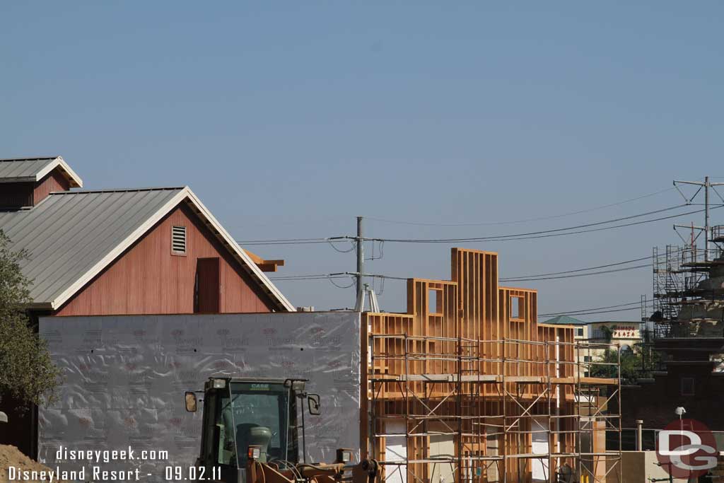 The facade on this building is going up.