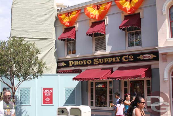 No visible progress on the photo store exterior work.