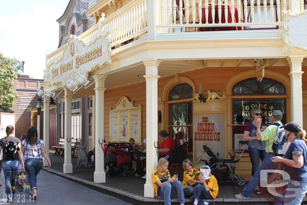 The walls have shifted further into Frontierland with the portion of the walkway nearest the Golden Horseshoe all done.