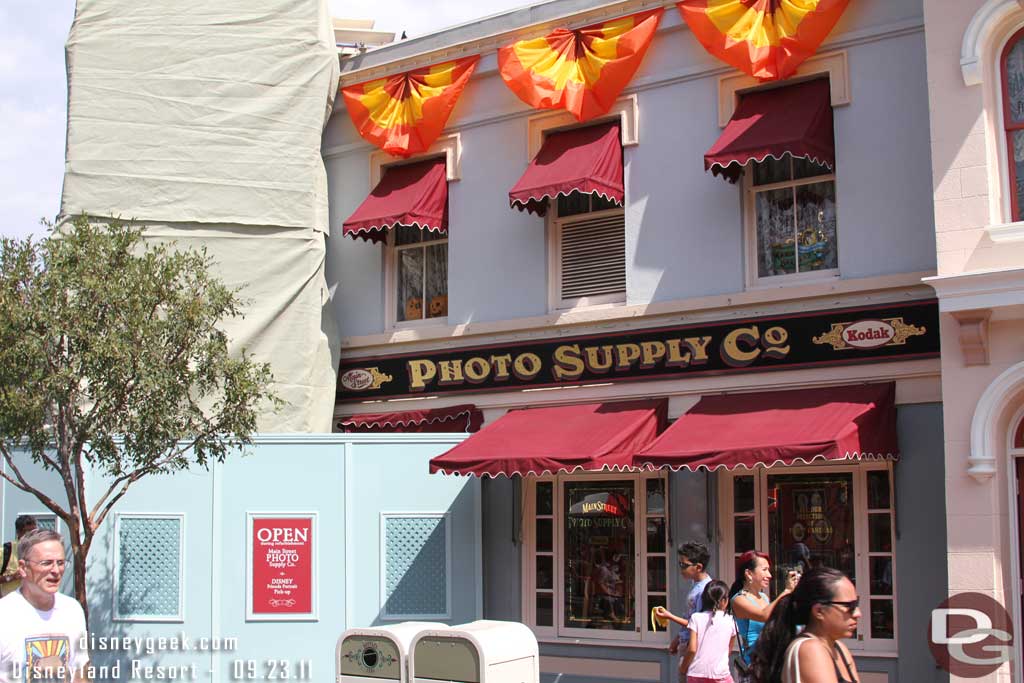 No visible progress on the photo store exterior work.