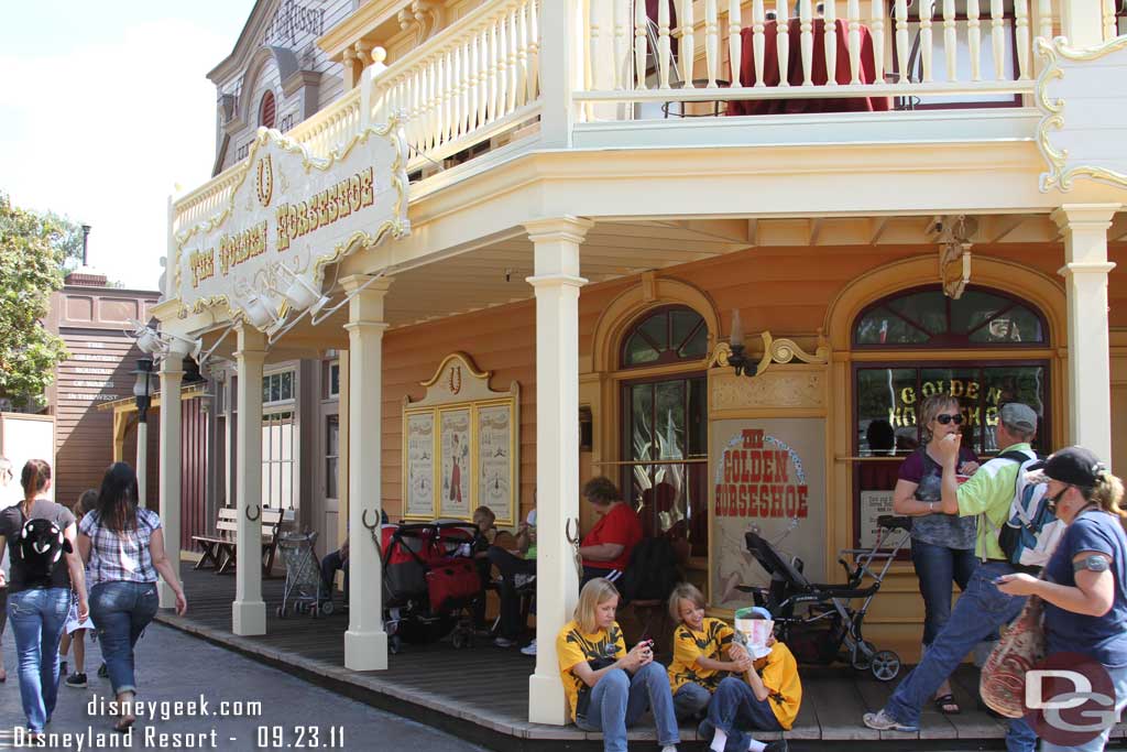 The walls have shifted further into Frontierland with the portion of the walkway nearest the Golden Horseshoe all done.