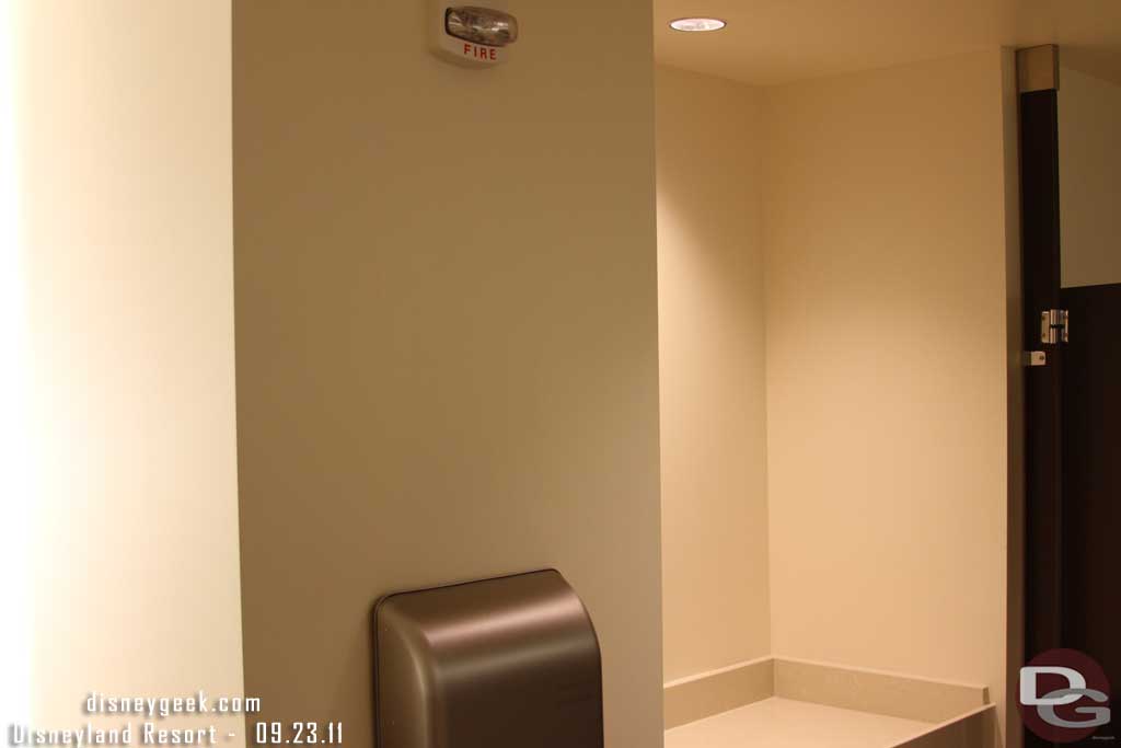 Took a peak in the restroom on the main floor, plain white walls too.