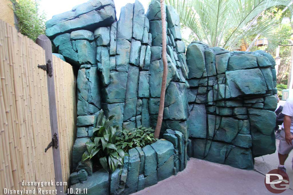 Over in Adventureland the restroom work is done.  The rocks seem much more green now.