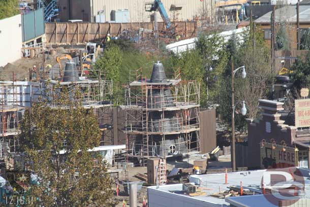 The Cozy Cones are inching along.  Also the backstage fence behind them looks to have been painted.