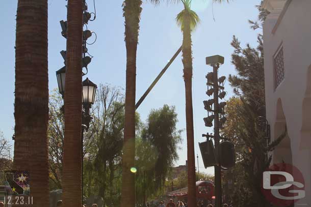 Looking down the parade route a crane operating in Cars Land.