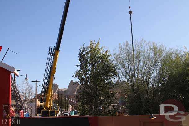 A look down Route 66 reveals work crews have taken over the street with trucks, dumpsters, and port-a-potties.