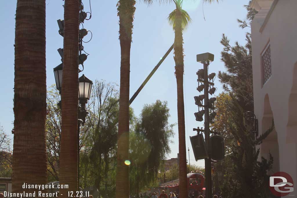 Looking down the parade route a crane operating in Cars Land.