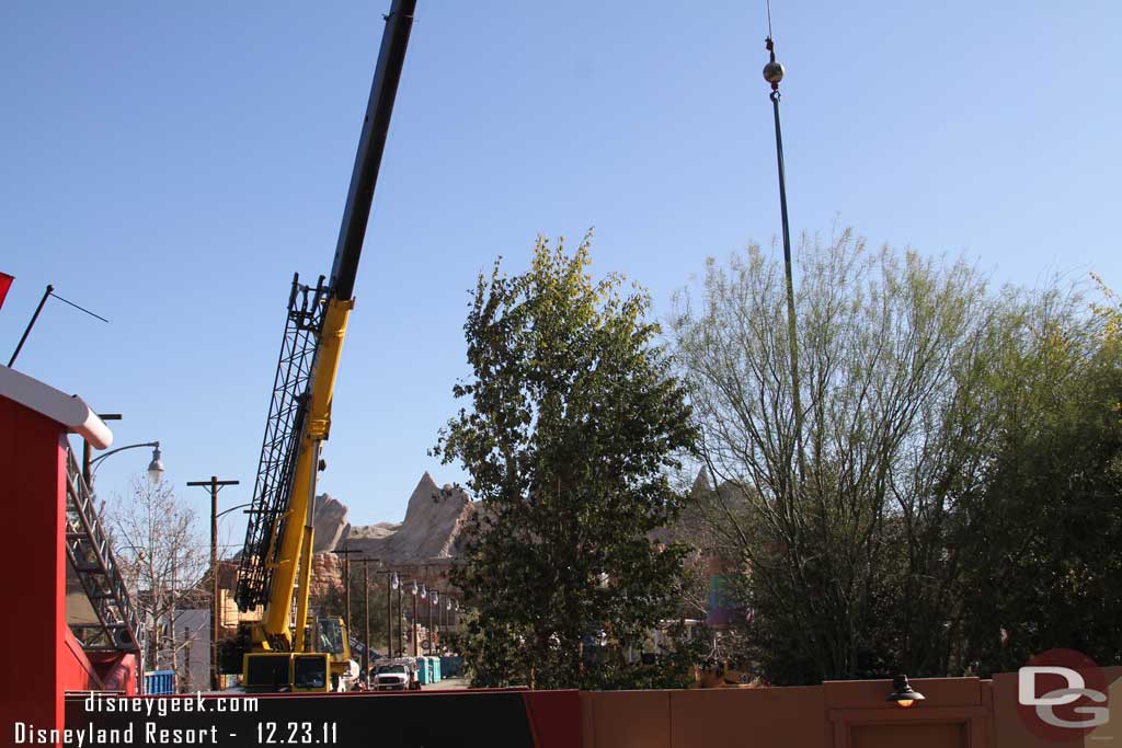 A look down Route 66 reveals work crews have taken over the street with trucks, dumpsters, and port-a-potties.