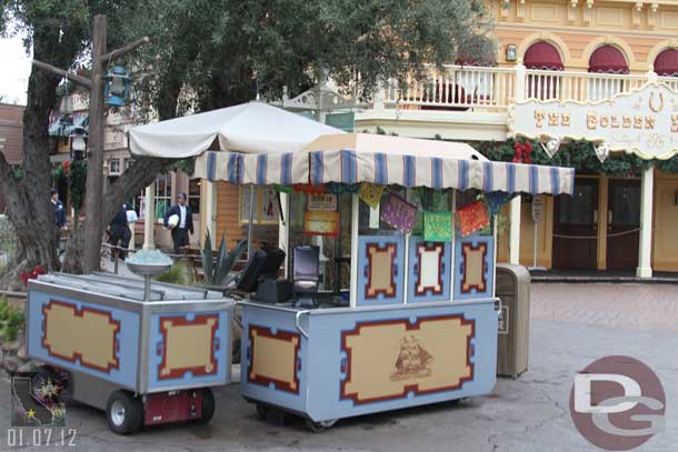 The Churro cart in Frontierland has some minor decorations and a special offering as part of the The Kings Day Celebration.