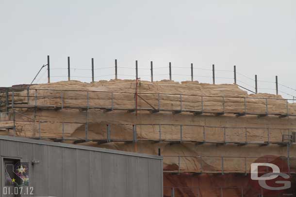 The painting is moving slowly on the rock face that overlooks the Pier.