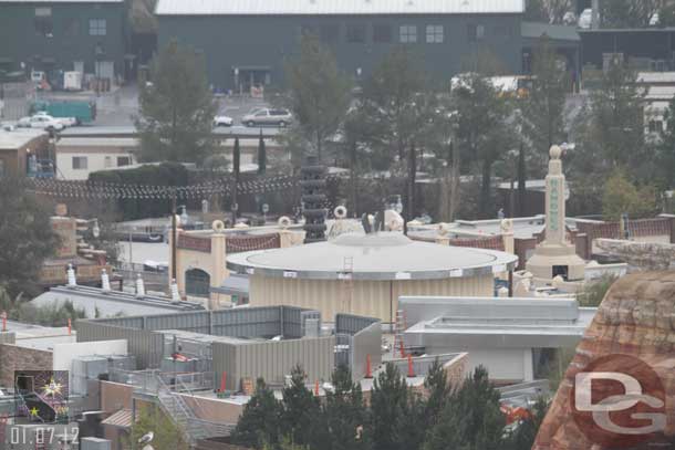 A closer look over toward the tires.  Looks like the lights are strung now above the attraction as well as to the tire tower.