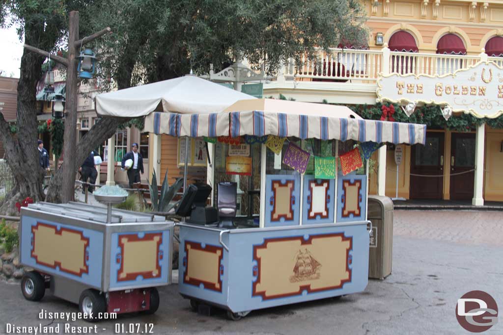 The Churro cart in Frontierland has some minor decorations and a special offering as part of the The Kings Day Celebration.