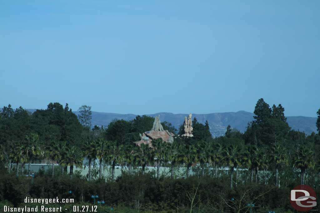 A closer look you can see Splash and Big Thunder Mountains sticking up amongst the trees.