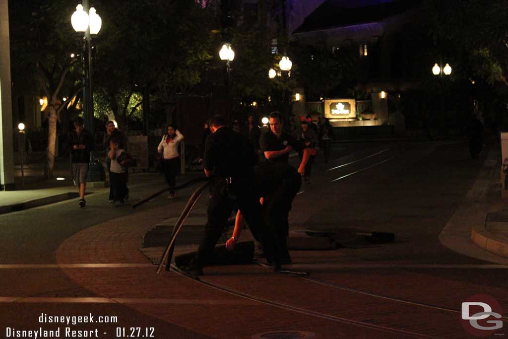 A crew covering the red car tracks.  My hunch was it was preparation for the run later this evening.