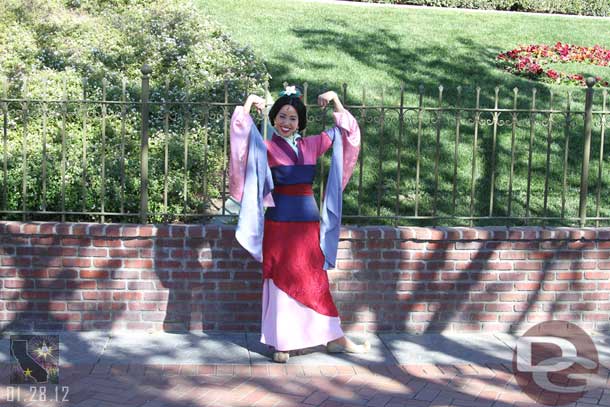 Mulan out for pictures as you enter Disneyland.