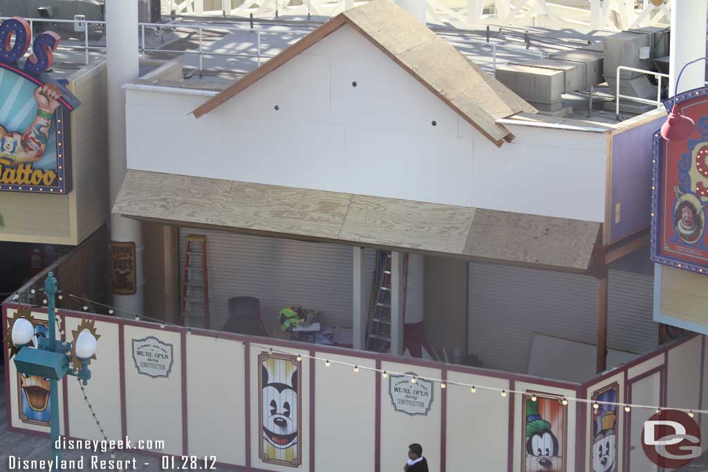 Time for a spin on the Fun Wheel.  The facade work on the midway shops is moving along.  