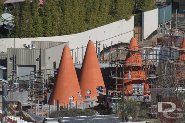 A closer look.    You can see the backstage wall taking shape behind the cones.