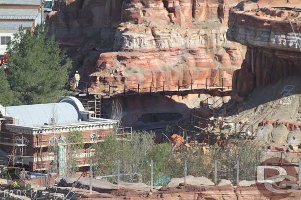 Looks like they are filling in the hole in the rock work along the track in the middle of this shot.