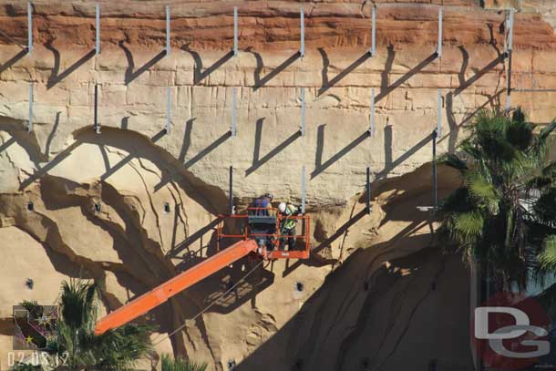 A crew removing the toothpicks