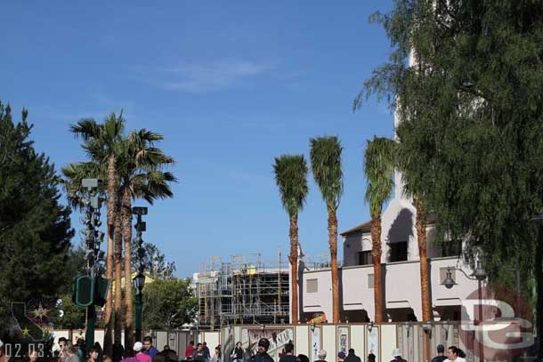 Looking down toward Buena Vista Street palm trees have sprung up along the Carthay side and another view of the trees around the fountain.