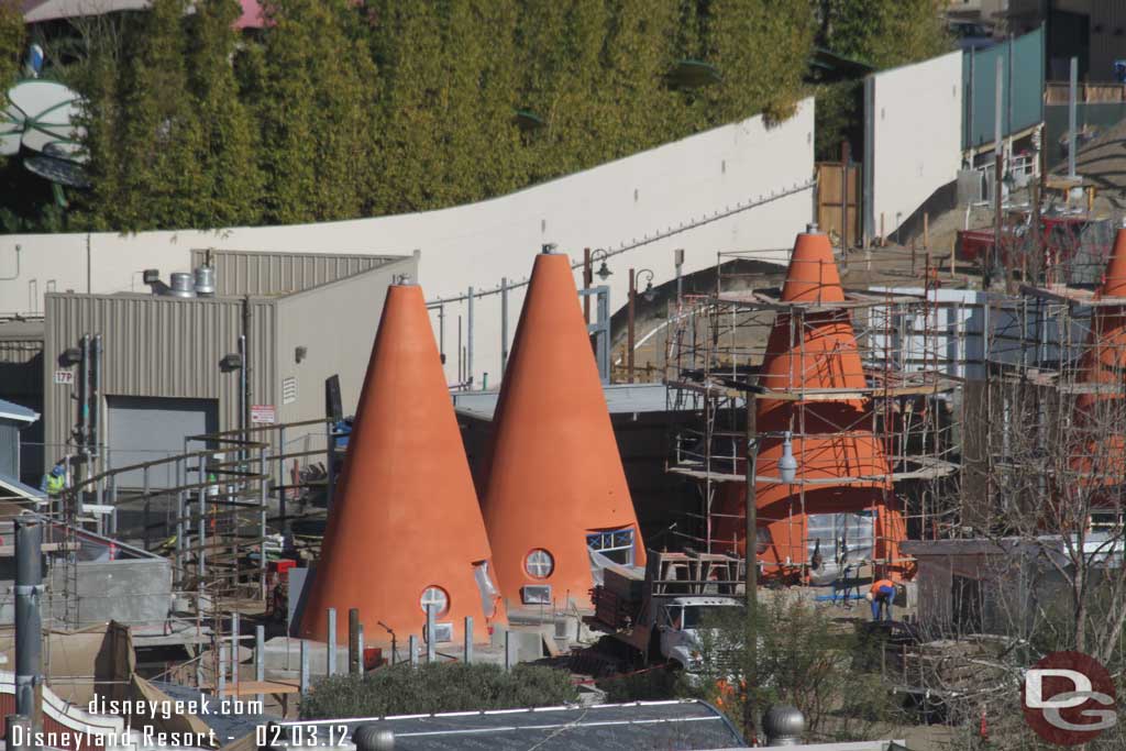 A closer look.    You can see the backstage wall taking shape behind the cones.