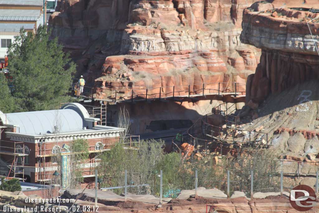 Looks like they are filling in the hole in the rock work along the track in the middle of this shot.