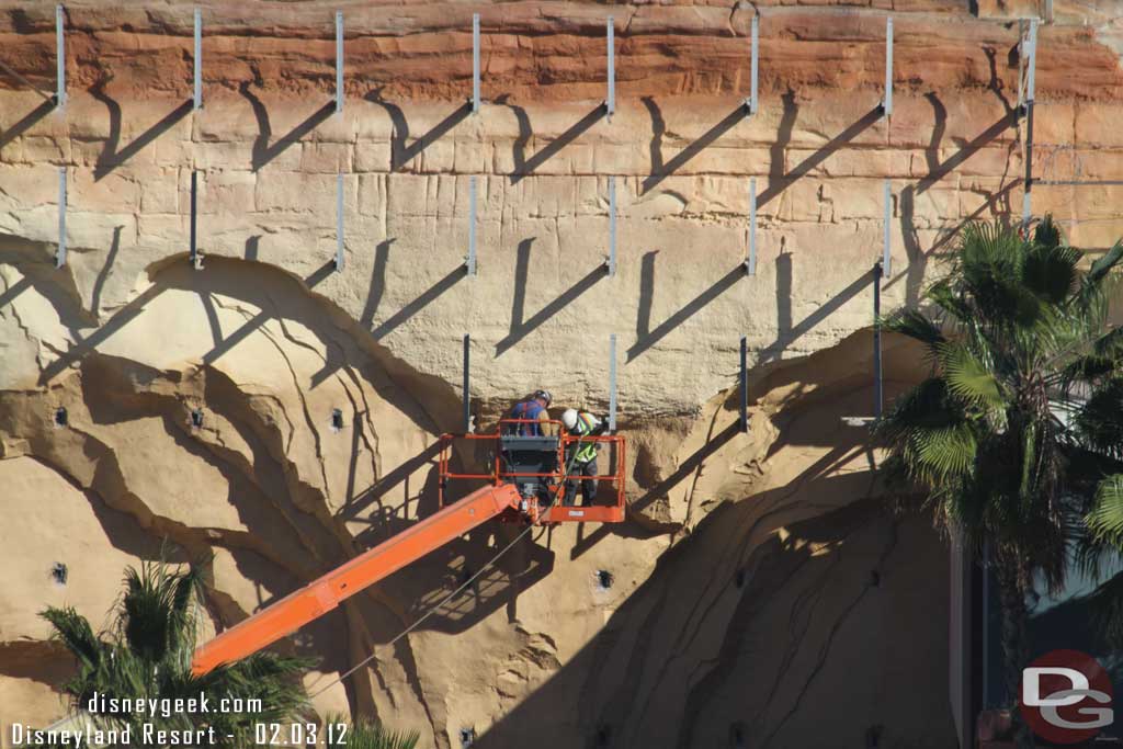 A crew removing the toothpicks