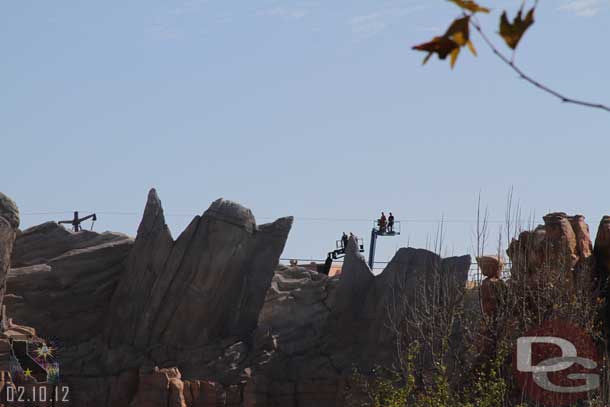 Spotted these two lifts peaking over the range.  Looked to be workers checking something out (most like the impressive view!)