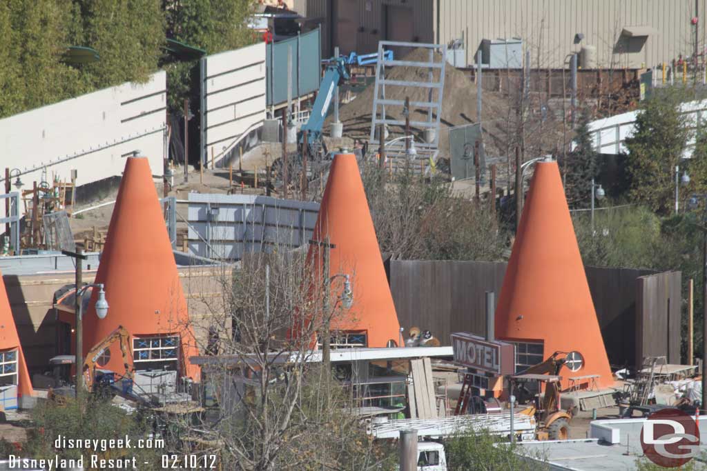 The sign for the Cozy Cones is partially installed.