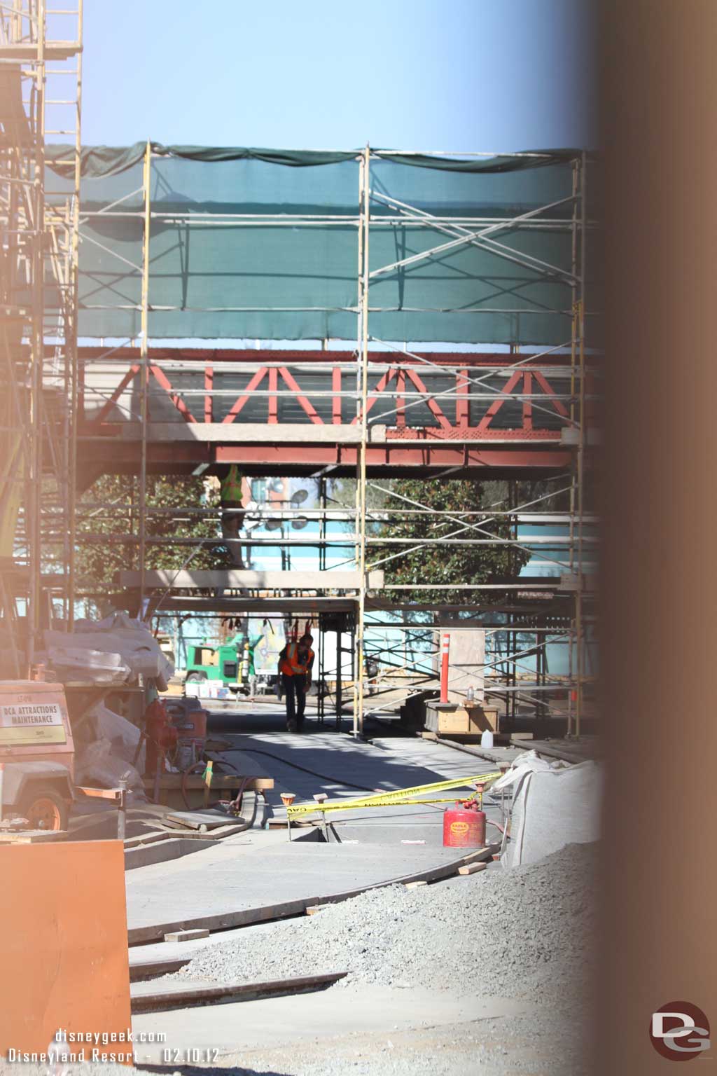 The main equipment gate was not aligned properly and had a good size gap so I could get a couple pictures.   Notice they have poured the concrete between the Red Car and the sidewalk.  Also the scaffolding now up around what is left of the Golden Gate. 