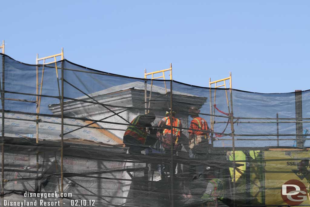 A crew working on preparing the facade above for its exterior coat of concrete (or is it stucco)