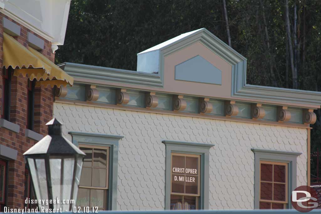 The scaffolding is down on the left side above the restrooms.  The repainting looks to be complete there.