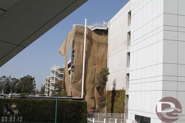 They are still working on one of the stairwells at the garage.  The wind had ripped the mesh.