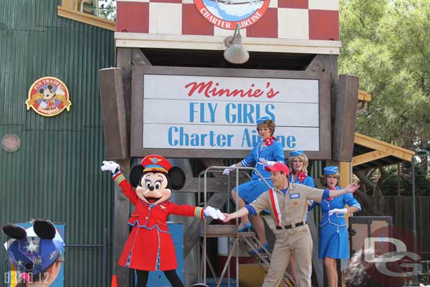 Minnie has changed from the Aviator outfit to a Flight Attendant.  This seems to work with the show better.