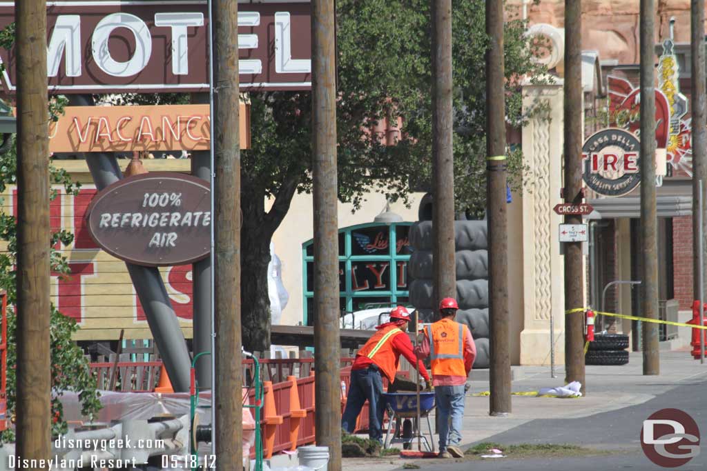 The other one working near the Cozy Cones, notice the fence too.