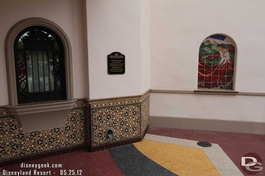 A plaque talking about the historical significance of the Carthay (12/21/37 is when Snow White premiered there).  A close up in several pages.