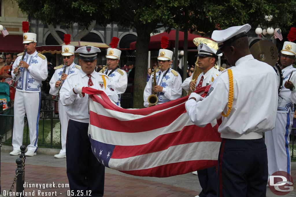 Folding the flags.