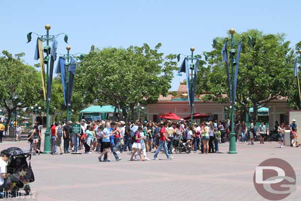 A long line of cast members and their guests waiting for their wristbands which would allow them onto Buena Vista Street and into Cars Land.