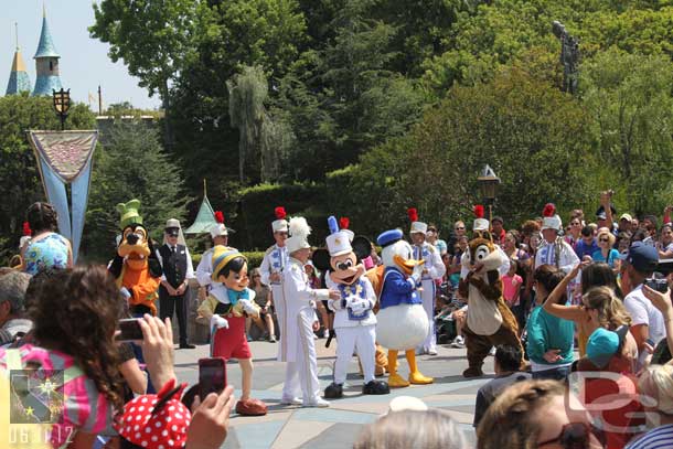 The Disneyland Band and some characters in front of the Castle.