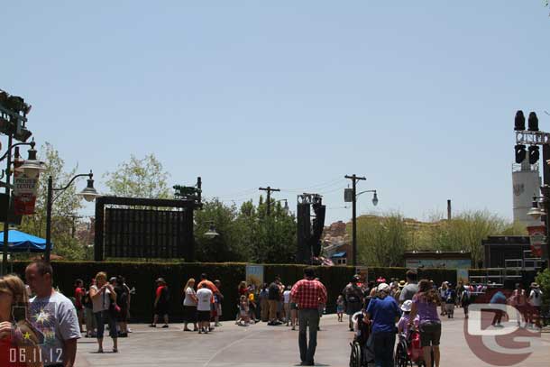 Working my way up the parade route. The construction walls are gone and hedges are now around Maters.  They have set up more gear for the opening celebration.