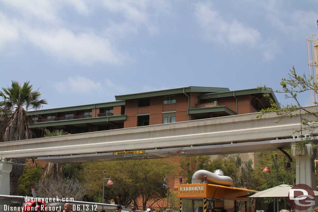 Time to head into the parks.  That is my room up on the top floor, the dark spot that is covered near the center of the picture.