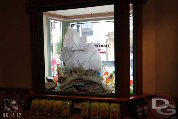 The window features a model of Rock Candy Mountain, an attraction that was designed for Disneyland but never built.