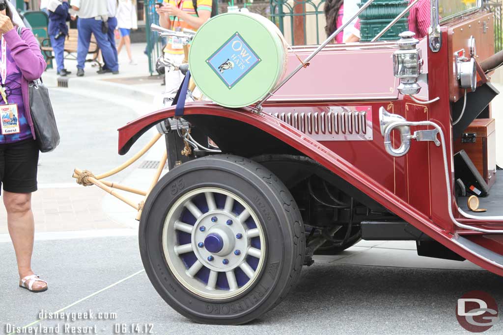 I like the red paint job on the car.  I believe this is the old grand marshal car from Disneyland that was white. 