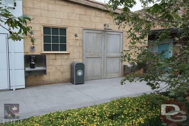 Looking toward the restrooms (note the only ones in Cars Land).  There is also one telephone.