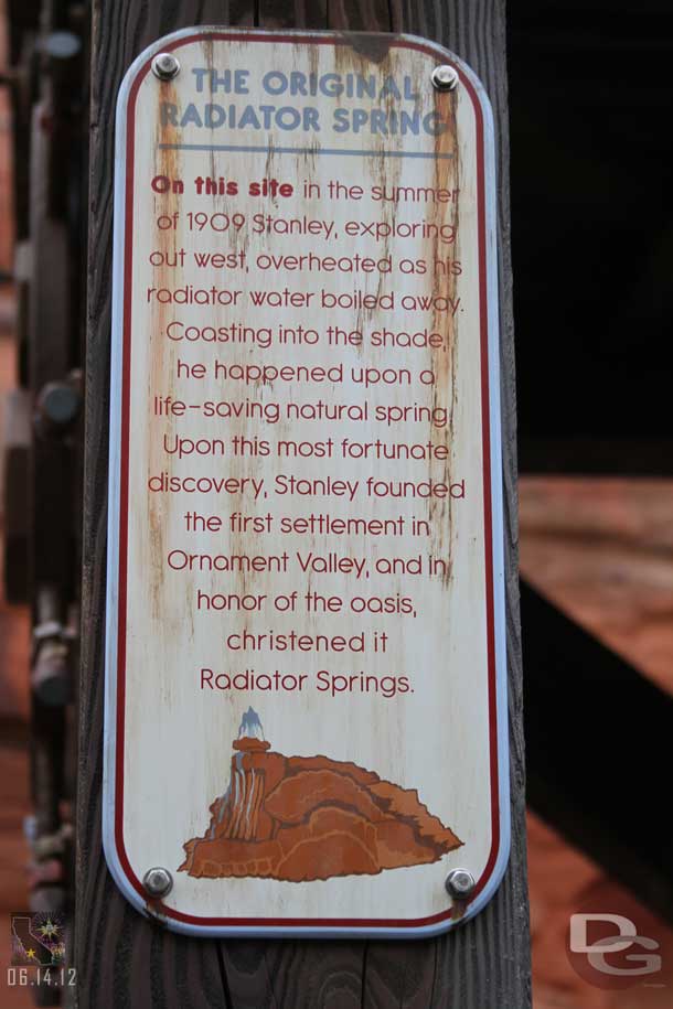 While waiting took some pictures of the signs in the queue.  They tell the story of the origins of Radiator Springs.