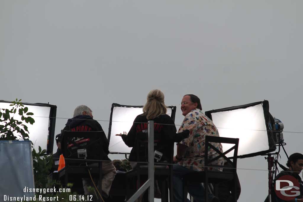 Spotted John Lasseter up on a roof doing an interview with a morning show.